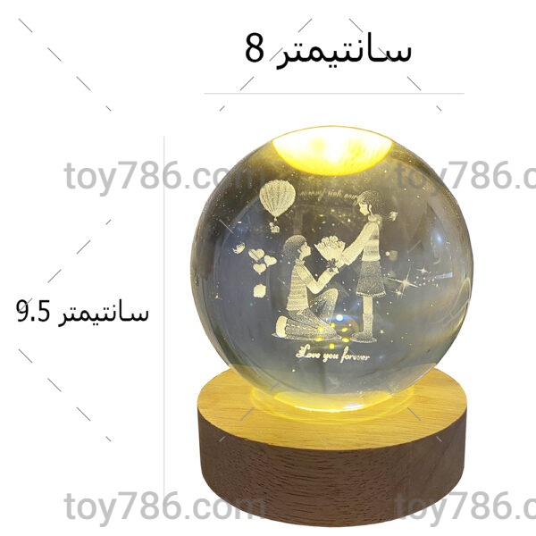 چراغ خواب رومیزی مدل گوی کریستال طرح دختر و پسر عاشق کد 01